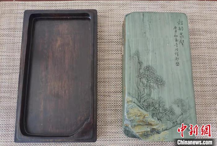 圖為盧保勝為提升洮硯文化內(nèi)涵，制作“一硯一銘、一盒一拓”成品展示?！堟?攝
